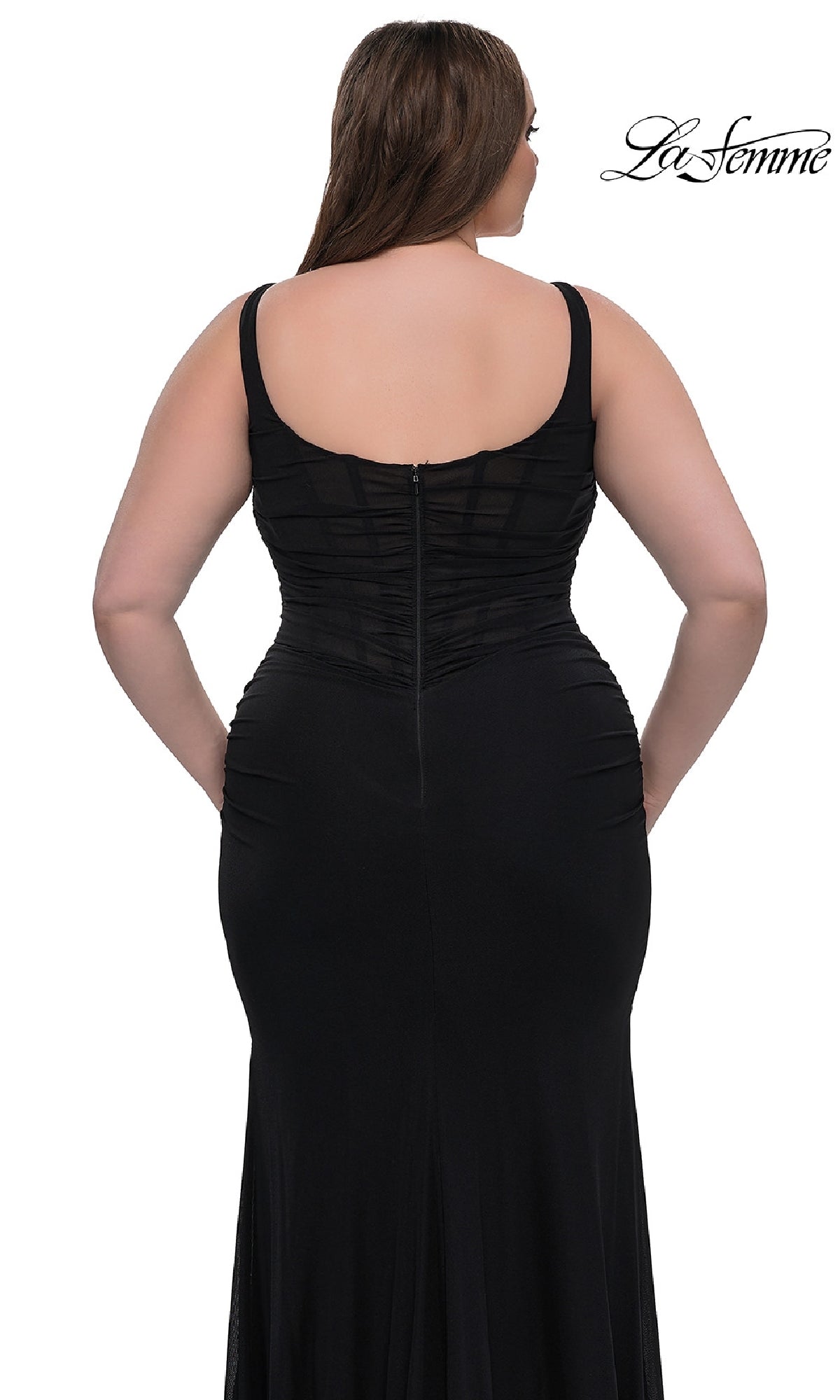 A woman models the Plus-Size Simple Long Prom Dress: La Femme 33005, a fitted sleeveless black evening gown with a sheer panel and zippered back, standing against a white background. The La Femme logo appears in the top right corner.
